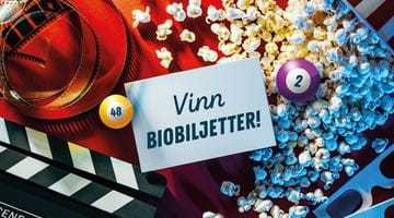Popcorn, filmrulle och skylt med texten "vinn biobiljetter"